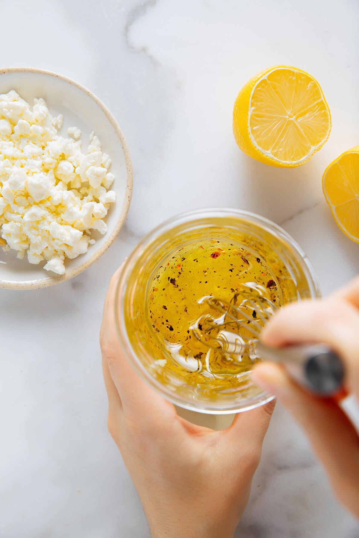 whisking lemon dressing