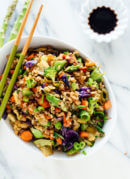 Vegetable fried rice made with extra veggies and brown rice, for health and flavor bonus points! Get the recipe at cookieandkate.com