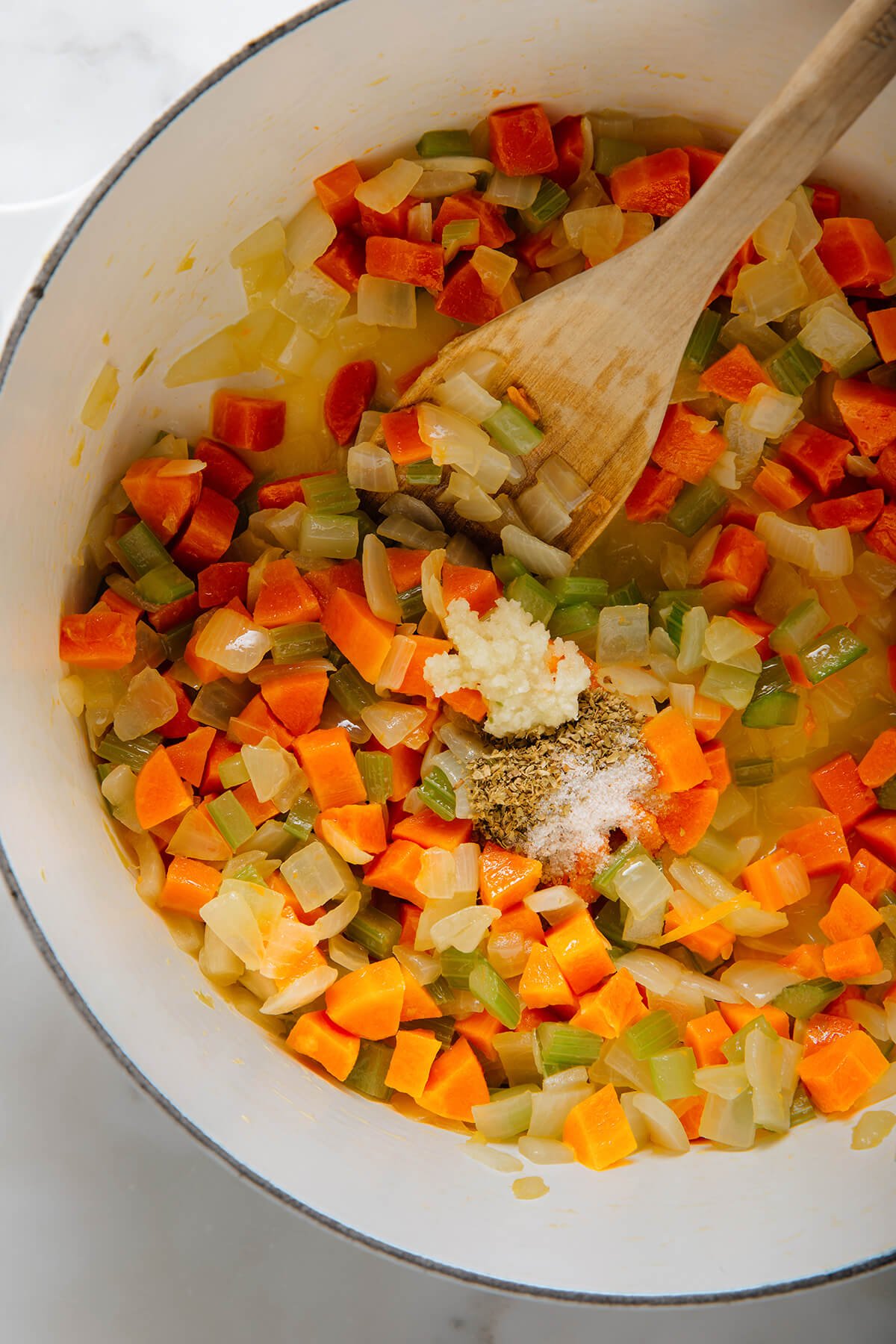 adding garlic and spices